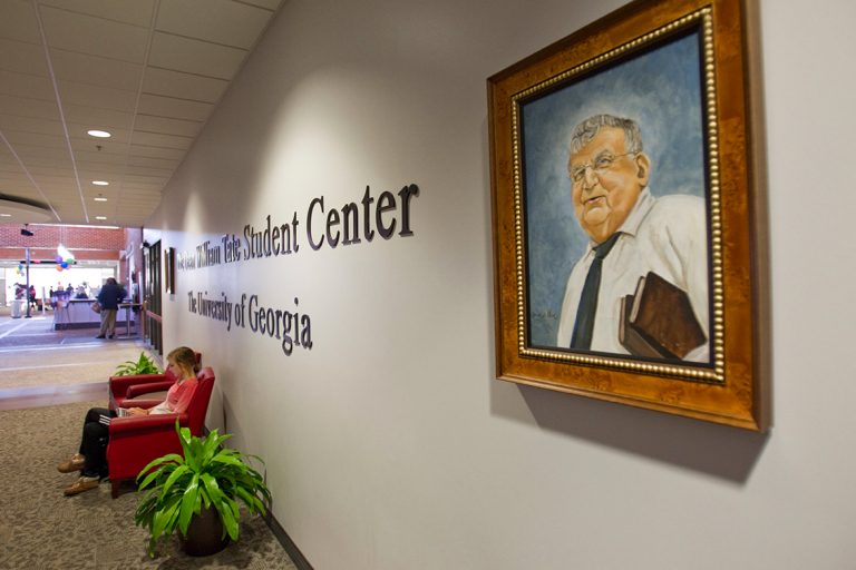The Portrait of Dean William Tate hanging in the Tate Student Center.